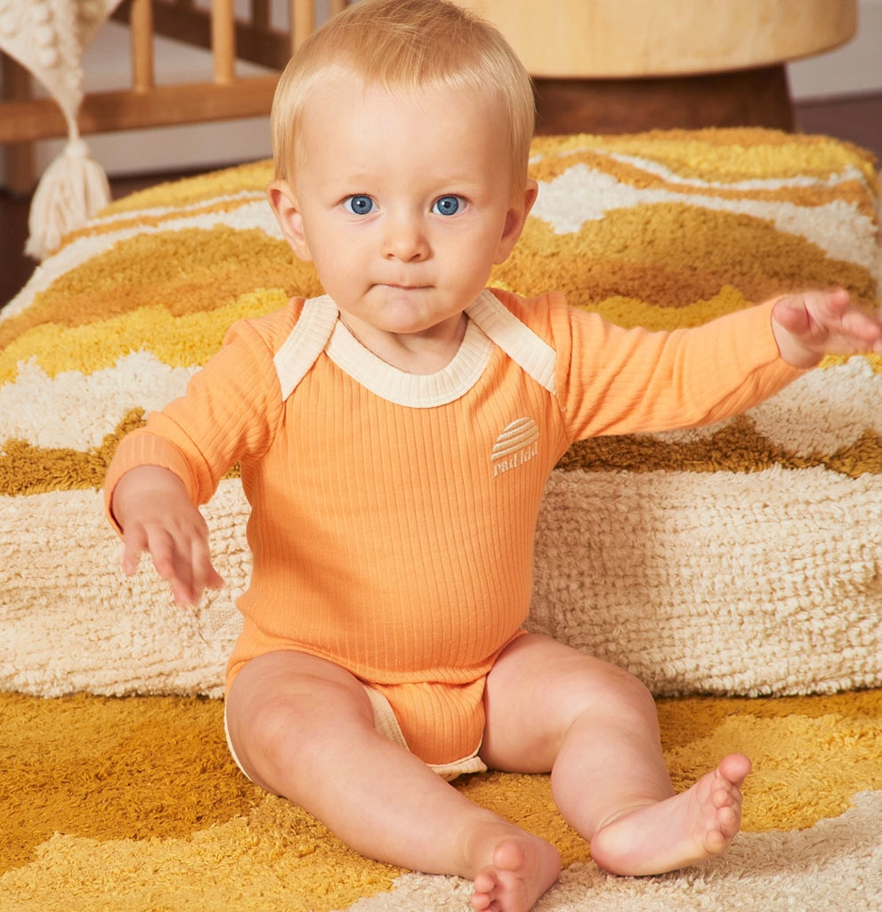 Peach Ribbed Organic Cotton Long Sleeve Onesie