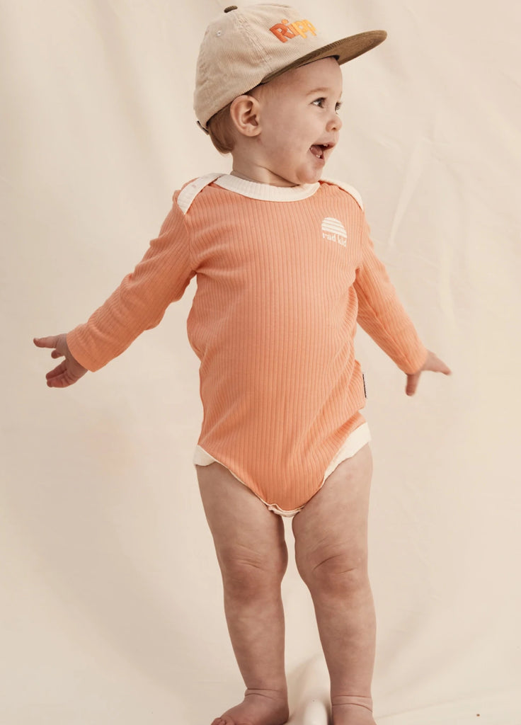 Peach Ribbed Organic Cotton Long Sleeve Onesie